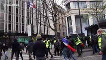 Violent Yellow Vest protests continue in Paris with clashes with police