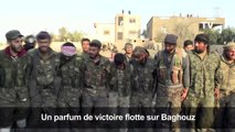 Des combattants des FDS célébrent la victoire imminente contre l'EI