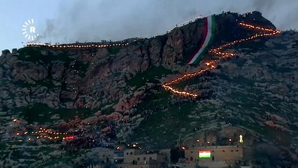 Watch: Iraqi Kurds celebrate Nowruz with torchlit mountain procession