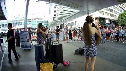 PRETTY LADIES BUSKING STAR FERRY IN HONG KONG