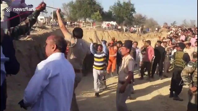 Indian boy trapped for two days in borewell is rescued in marathon operation