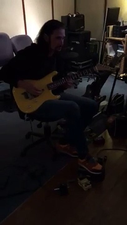 Bruce Kulick  with a "Banana" ESP guitar