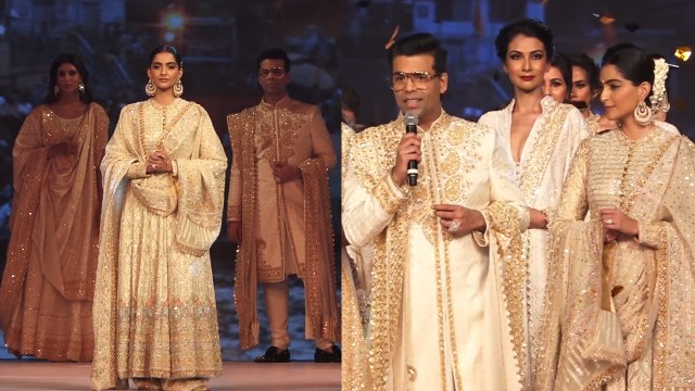 Karan Johar & Sonam Kapoor walked the ramp for designers Abu Jani and Sandeep Khosla | FilmiBeat