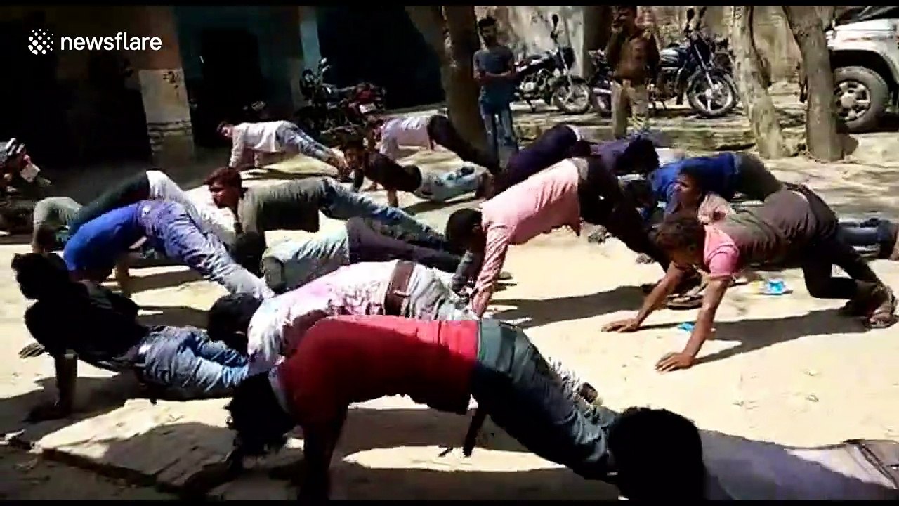 Indian bikers forced to do push-ups as punishment for breaking traffic rules