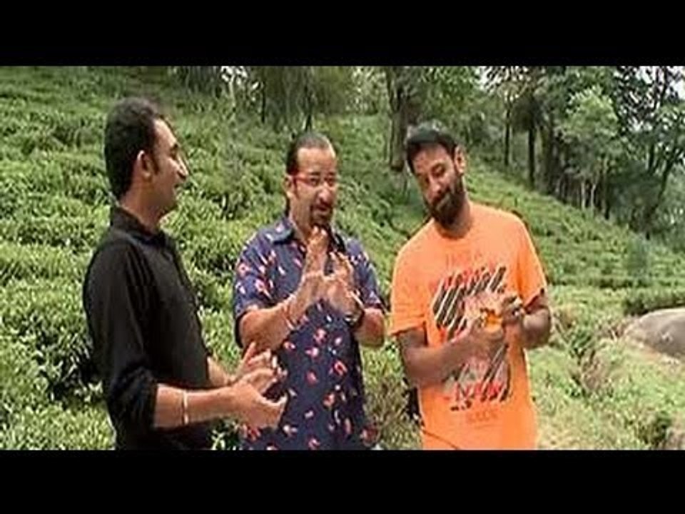 Rocky & Mayur enjoy freshly brewed tea amidst tea gardens