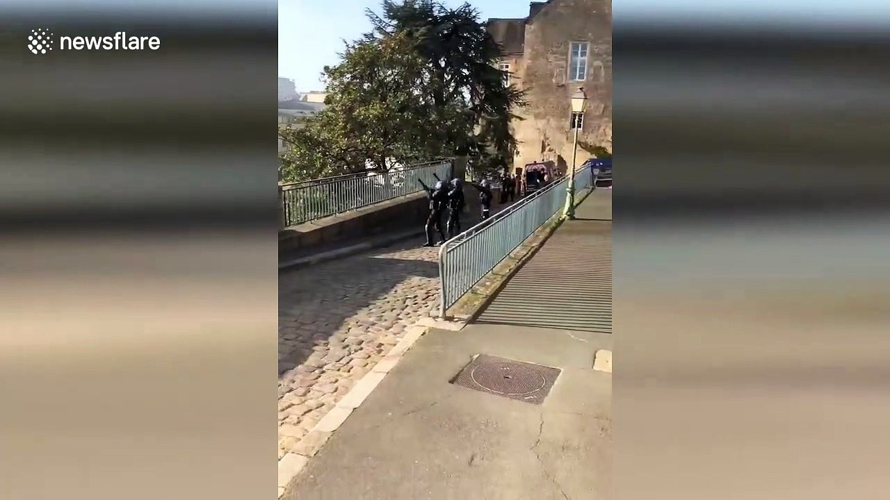 Workers clash with French riot police in Le Mans city centre