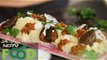 Watch recipe: Couscous with Achari Baingan & Yogurt