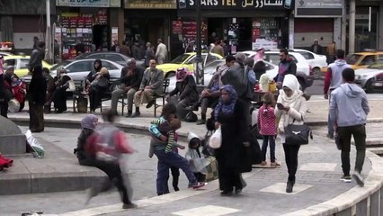 أهالي دمشق يرحبون بانتهاء"الخلافة" في سوريا