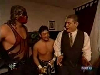 undertaker, kane, & sara in william reagals office