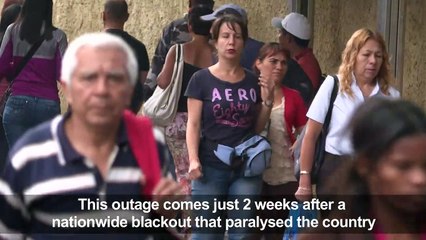 Venezuelans react to a new near-nationwide blackout