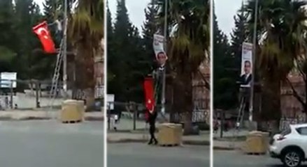 Türk bayrağını indirip AKP afişi astılar