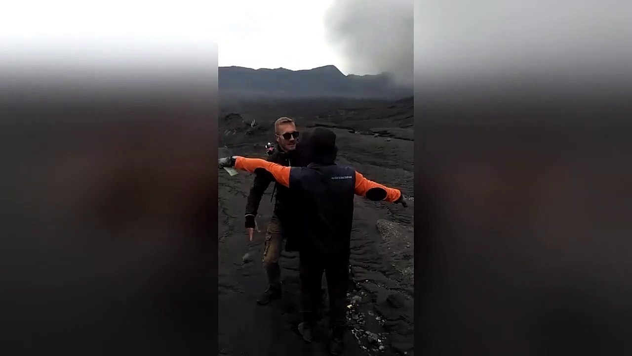 German tourist wrestles park ranger to ground after trying to hike erupting Indonesia volcano
