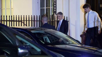 Hammond leaves Downing Street for Commons