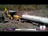 Así es como estaban enterrados 2 tanques de huachicol con 480 mil litros | Noticias con Yuriria