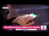 Instalan los primeros semáforos para adictos al celular | Noticias con Yuriria Sierra