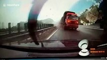 Car narrowly avoids being crushed by out-of-control transport truck