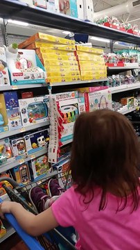 Big Box Store Robot Roams the Aisle