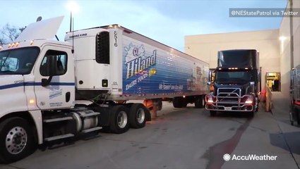 Communities work together to deliver food to town stranded by flooding