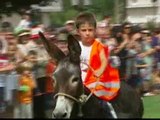 Record de participación en la carrera de burros de Escarión