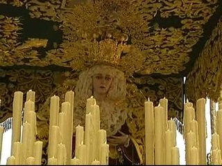 Banderas participa en una procesión en Málaga