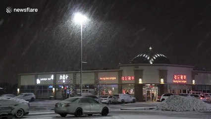 Heavy snow hits Toronto, Canada as winter weather returns for April