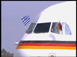 Merkel pisa Atenas