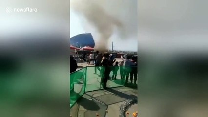 Horrifying video of dust devil blowing away bouncy castle in China's Henan, killing two children