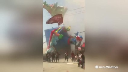 Frightening video shows dust devil sweep bouncy house into air, killing two children