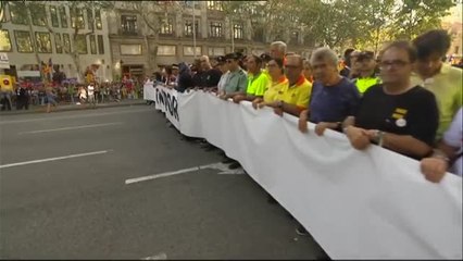 Los héroes anónimos de los atentados, al frente de la manifestación de Barcelona