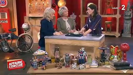 Une participante d'Affaire Conclue reste bouche bée devant la haute estimation de son objet