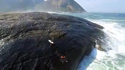 Slipping Surfers Slide into the Surf
