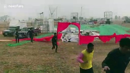 Disastrous moment tropical storm in Thailand destroys couple's dream outdoor wedding