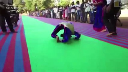 Indian girl sets two world records for most forward rolls in contorted yoga pose