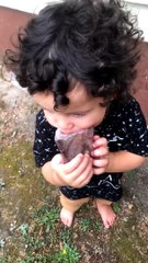 Kid Has a Fish Head for a Snack