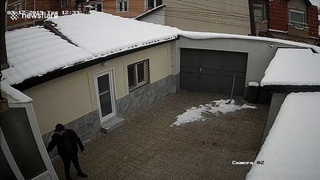 Instant karma as man gets hit with falling snow drift after arguing with wife