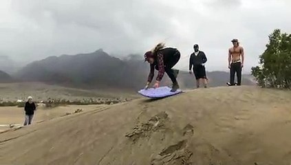 Woman Tries To Body Surf Down A Dune Fails To Account For Friction