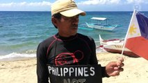 Fisherman raises PH flag to oppose Chinese vessel in Batangas