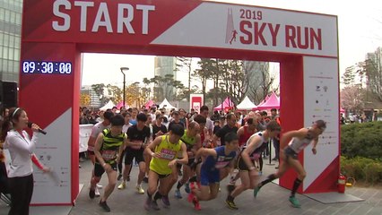 '오르고 뛰고'...도심 깨우는 봄맞이 마라톤 / YTN