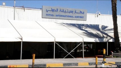 Tripoli's only functional airport hit by air raid as clashes rage