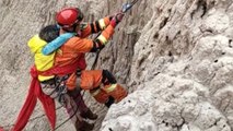 Woman hiker rescued after falling into deep ravine in western China