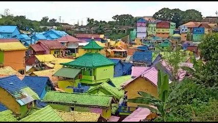 Former slum in eastern Indonesia rebuilt into 'rainbow village'