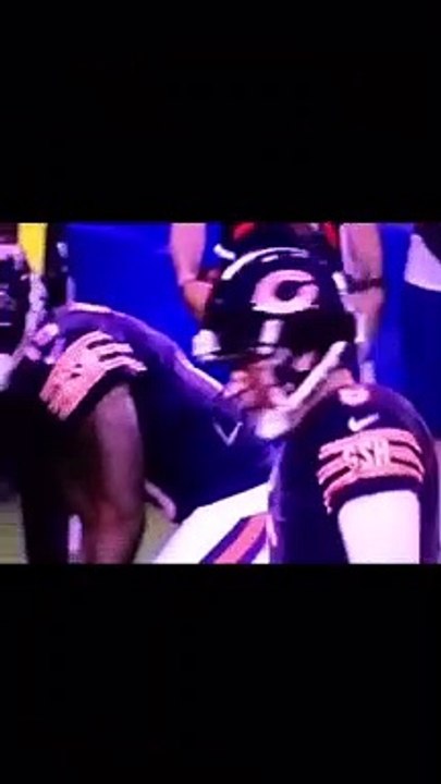 Roy Miller explodes through the Bears offensive line for a TFL