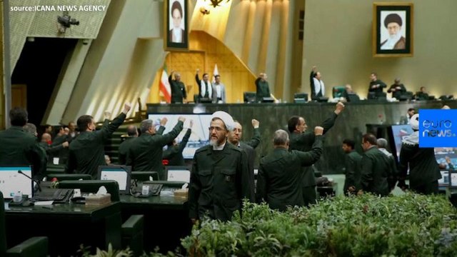 Watch: Iran's lawmakers wear Revolutionary Guards' uniforms to Parliament