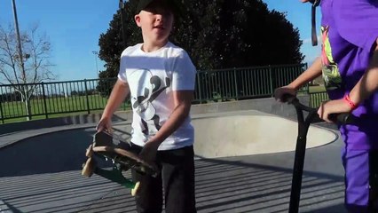 PUPPY DOG RIDING A SCOOTER