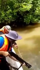 awesome Crocodile Executed With Shotgun for Killing Fisherman in Borneo