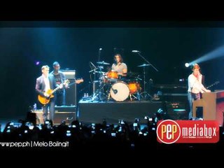 Hanson performs "MMMBop" during the Shout It Out concert at Smart Araneta
