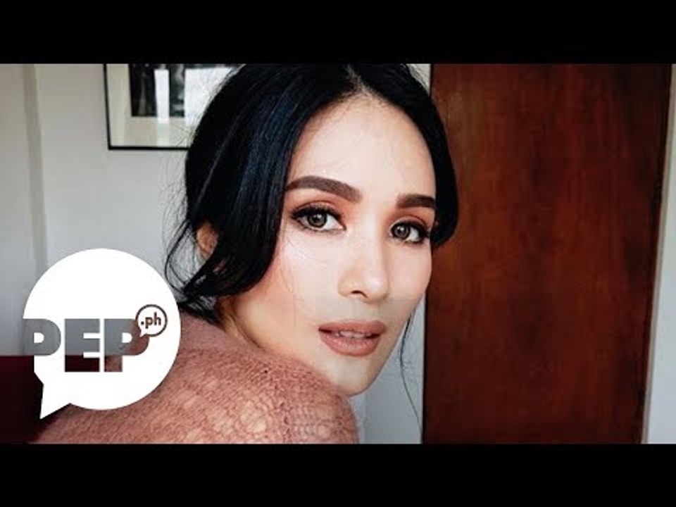 Heart Evangelista holds back tears as she answers a question