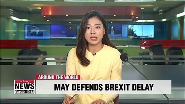 Theresa May defends Brexit delay amid calls for resignation