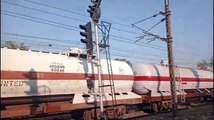 Train Race EMU Versus Liquid Petroleum Gas Carrying Train