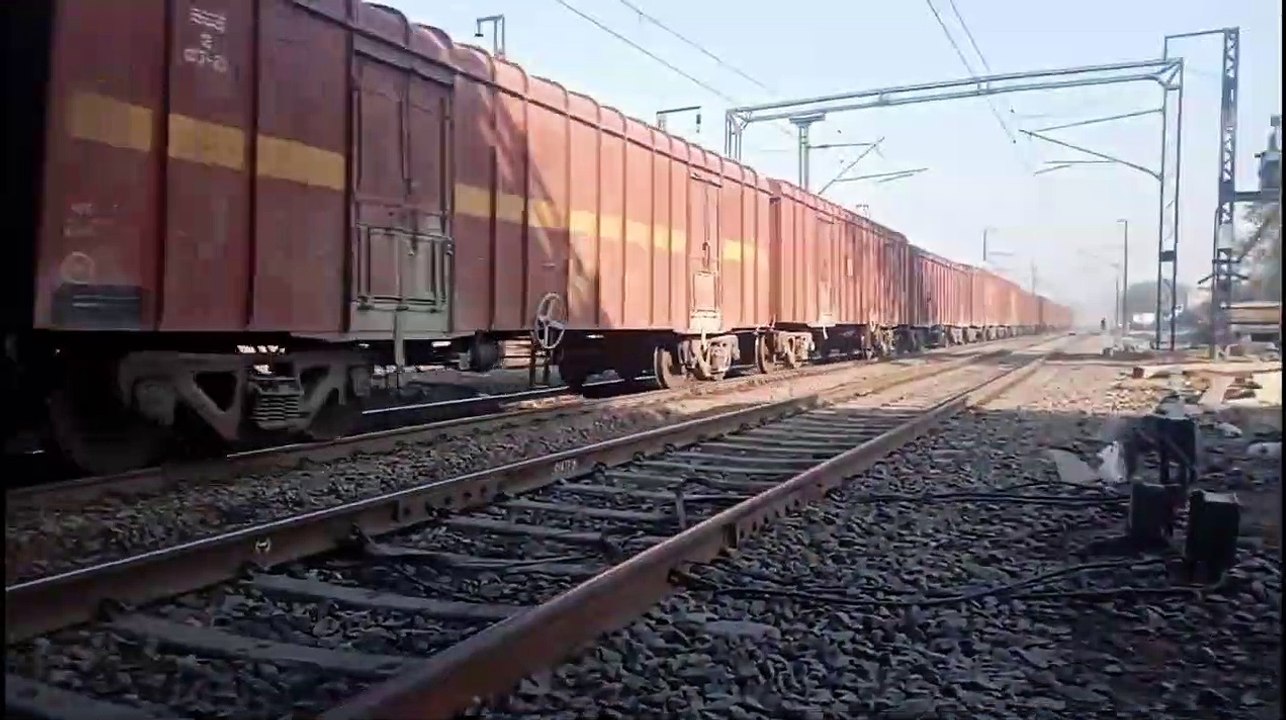 INDIAN RAILWAY  CARRYING CEMENT CONTAINER